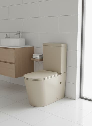 Bej rəngli unitaz dəsti, müasir dizaynlı və quraşdırılması asan. Su