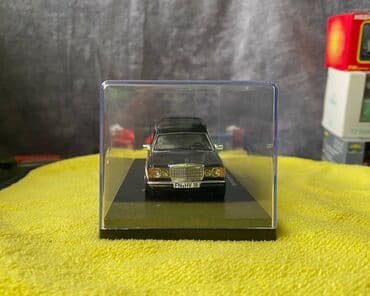 metbex tavan modelleri: Коллекционная модель Mercedes-Benz 200 W123 Hearse black 1982 Schuco — 8