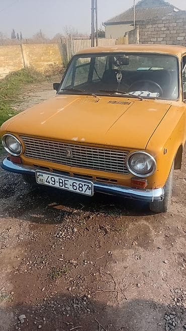 VAZ 2101 “Jiquli” sedan - Küllü sarı rəngli klassik kuzov, xrom ön və