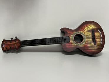 simsek makvin: Uşaq üçün oyuncaq gitara - Model: “Guitar” yazılı başlıq, korpusda — 1