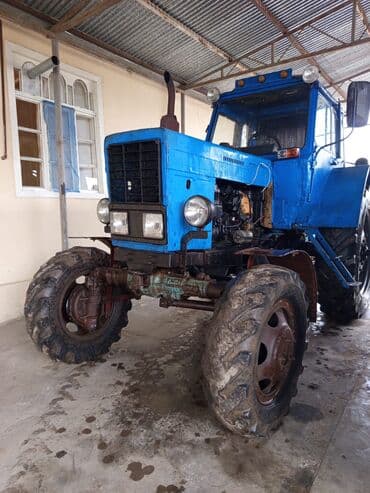 Mavi rəngli təkərli traktor Texniki xüsusiyyətlər və təyinat: - Ön və