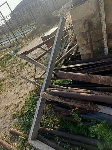 qaplar ev: Dəmir qalın qaraj qapısı.Uzunlugu 2.5 m.Hundurluk 1.90 m.Karkas qalın — 4