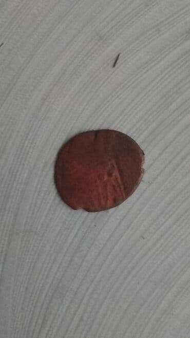 CD, DVD disklər və kassetlər: Məhsul: Köhnə mis sikkə (4 ədəd) Təsvir: - Material: mis - Say: 4 — 4