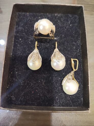 Dəstə daxildir: Üzük, Sırğa, Kulon, Sarı qızıl, 585 Əyar, 19 g