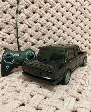 taksi islemek ucun masinlar: ● Oyuncaq Maşin vaz 2107 ● Zariyatqa ile işleyir ● Pultla idare — 3