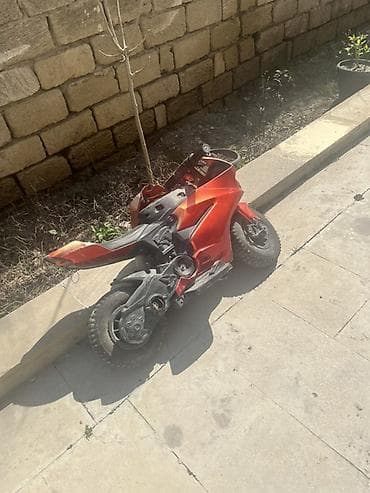 Uşaq üçün elektrikli motosiklet oyuncağı - Korpus: idman üslubunda