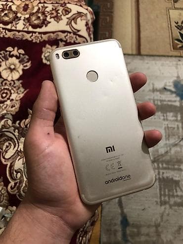 oppo find x6 pro: Xiaomi Mi A1, 64 GB, rəng - Qara, 
 Sensor, Barmaq izi, İki sim kartlı — 4