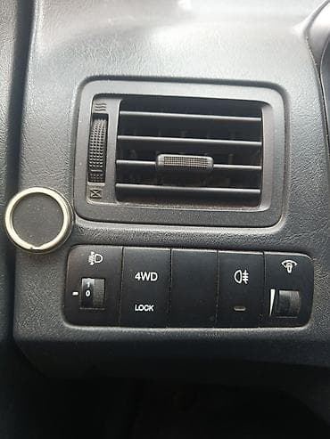 guzgusu: Hyundai Tucson (1-ci nəsil) krossover/SUV - Korpus rəngi: açıq gümüş — 9