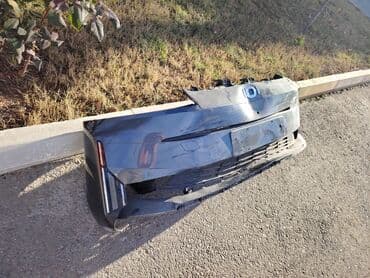 Кузовные детали: Məhsul: avtomobilin ön bamperi (komplekt) - Rəng: tünd boz/metalik - — 1