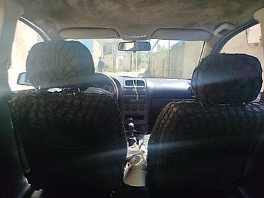 daewoo gentra 2010: Opel Astra: 1.6 l | 2003 il Van/Minivan — 5