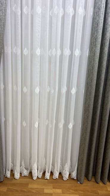 tül parçalar: Ağ rəngli, nazik, şəffaf parçadır. Üzərində həndəsi naxışlar var — 10