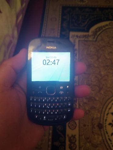 telefon nomresi: Nokia 1, rəng - Qara, Düyməli — 1