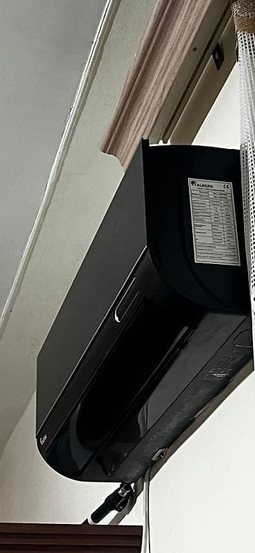 Alberg divar tipli kondisioner – qara rəngli, şık dizayn — 1