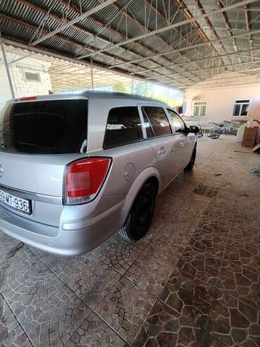 disk təkər type 0: Opel Astra H hatchback – gümüş rəng. Əsas xüsusiyyətlər: 2006 furqon — 5