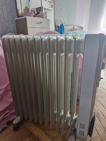 su radiatoru ev: Yağlı radiator (elektrikli) - Tip: Yağla doldurulan elektrik — 1