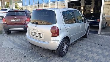 maşınlar avtomobil: Renault Modus, gümüşü rəng, 5 qapı, kompakt monovolumen kuzov — 2