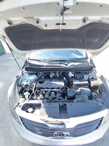 hediye qutusu: Kia Sportage: 2 l | 2012 il Universal — 16