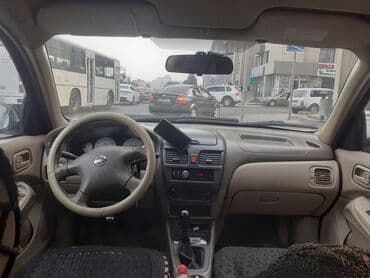 nissan qashqai 2008: Nissan Sunny: 1.3 l | 2006 il Sedan — 7