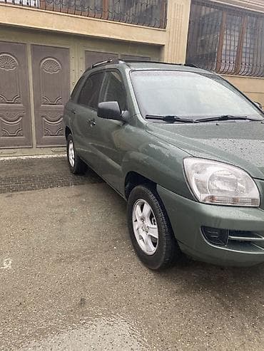 Kia: Kia Sportage: 2 л | 2007 г. Кроссовер — 3