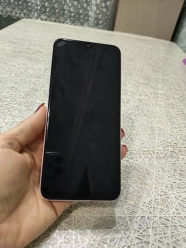 Smartfon – çəhrayı gövdə, yan hissədə fiziki barmaq izi skaneri olan