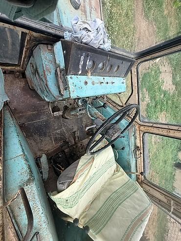 traktör satış: Universaldır: ön qreyder bıçağı və arxa ekskavator kovası olan təkərli — 5