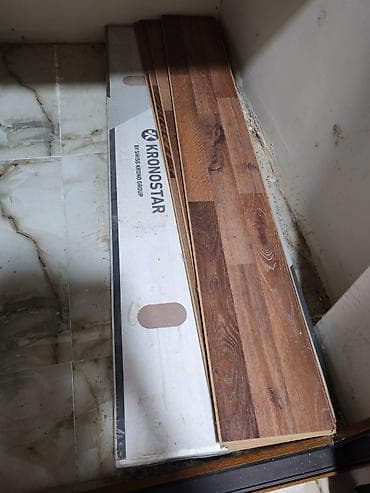 Laminat 6 kv 2 qutu artiq qalib Acilmayib.Qiymet 40 azn Unvan Hövsan