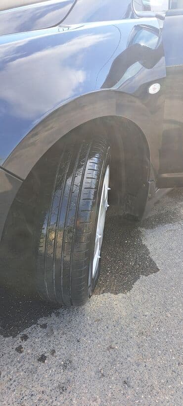 faizsiz kreditlə maşın: Nissan Tiida avtomobili hər gün rahat istifadə üçün nəzərdə tutulmuş — 16