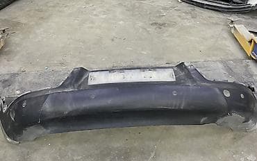 qazel kuzasi: Arxa, Kia Sportec — 1