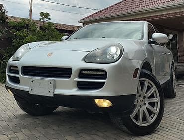 mitsubishi lancer evolution: Porsche Cayenne (1-ci nəsil) – gümüşü rəngdə premium SUV. İli 2008 — 4