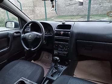 formula tekerler: Opel Astra: 1.8 l | 1999 il 250000 km Sedan — 9