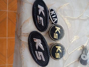 фольксваген поло новый кузов комплектации и цены: Kia K5 üçün emblem dəsti - Komplekt: 2 ədəd böyük oval “K5” ön/arxa — 2