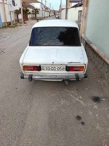 30 kuza: VAZ 2106 sedan, ağ rəng. mator karofka super veizyetde ustundeki — 9
