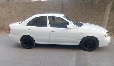 guzgu manitor: Nissan Sunny (N16) sedan – ağ rəng Xüsusiyyətlər: - Kuzov: 4 qapılı — 10