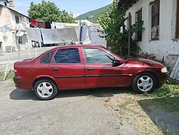 07 diskleri: Opel Vectra: 1.6 l | 1997 il 485 km Sedan — 2