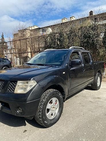 Nissan Navara: 2.5 л | 2012 г. Пикап — 5