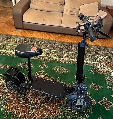 Elektrik nəqliyyatı: Elektrik skuter – oturacaqlı, güclü asqılı və geniş platformalı, 60 km — 1