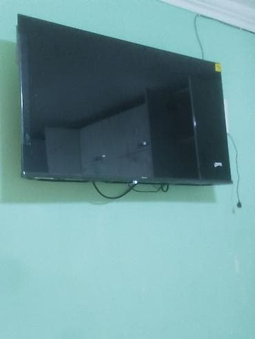 Смарт ТВ приставки: Divar üçün asma LED televizor - Yastı ekran, təxminən 40–50 düym — 1