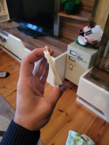 tikanlı tel: Samsung Galaxy S24, 128 GB, rəng - Bej, Simsiz şarj — 3