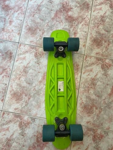 Butslar: Yaşıl rəngdə penny tipli skeytbord. Yüngül və daşınabilir dizayna — 2