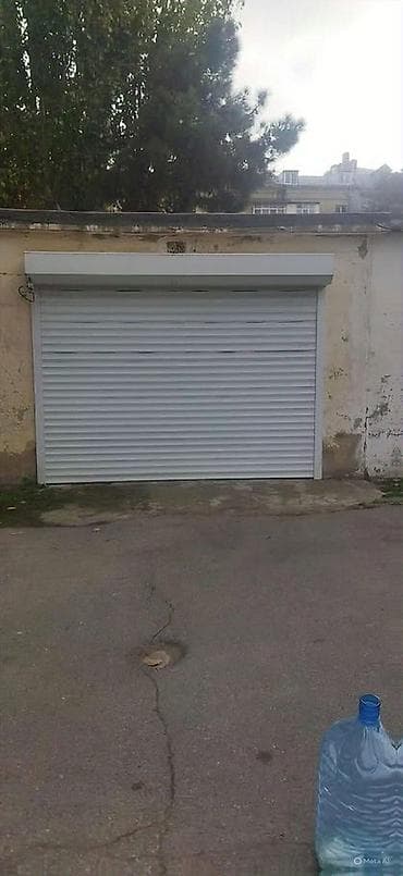 Mənzillər: Qaraj/Anbar sahəsi - Tək maşınlıq qapalı qaraj, metal jalüzlü — 4