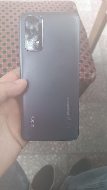 en ucuz telefon: Redmi smartfon - Arxa qapaqda “Redmi” loqosu və çoxkameralı modul - — 1
