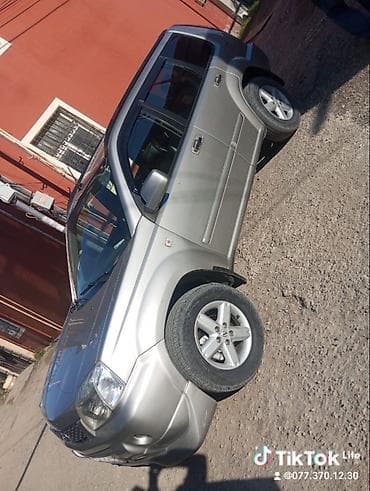 opel astra kupe: Nissan X-Trail SUV - Krossover/SUV kuzov, gümüşü rəng - 5 qapı, 5 — 1