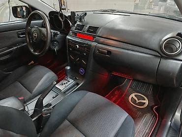 qapi zili: Mazda 3 sedan - Kuzov: sedan, tünd-boz rəng - Mühərrik: benzin (detal — 5