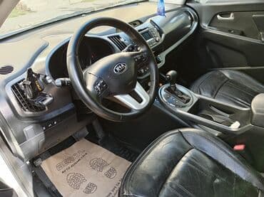 hyundai getz 2004: Kia Sportage: 2.4 l | 2012 il Krossover — 8