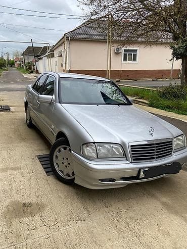 07 sekilleri cekmek: Mercedes-Benz C-Sinif sedan (W202), gümüşü rəng. - Kuzov: 4 qapılı — 1
