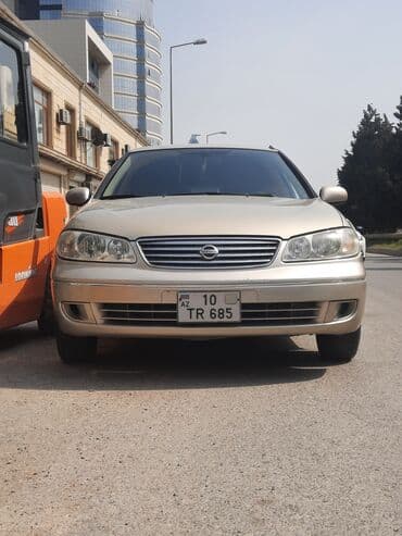 Nissan Sunny: 1.3 l | 2006 il Sedan