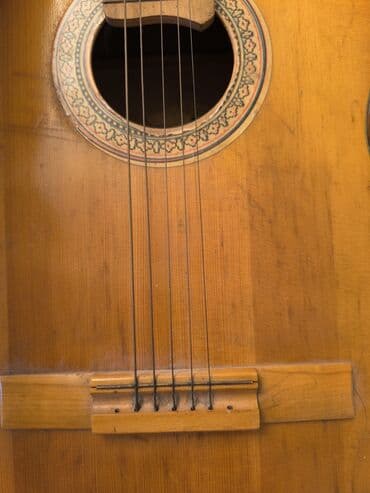 gitara dayağı: Klassik gitara, İşlənmiş, Ünvandan götürmə — 3