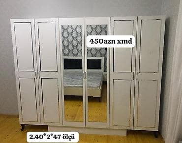 dolab termo: Ağ rəngdə 6 qapılı paltar şkafı. Orta hissədə 2 böyük güzgü qapı — 1