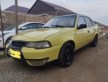 Model: Daewoo Nexia (sedan) Rəng: açıq sarı Kuzov: 4 qapı, ön və arxa