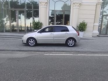 corolla cros: Toyota Corolla (E120) hatchback – gümüşü rəng Texniki və dizayn — 8
